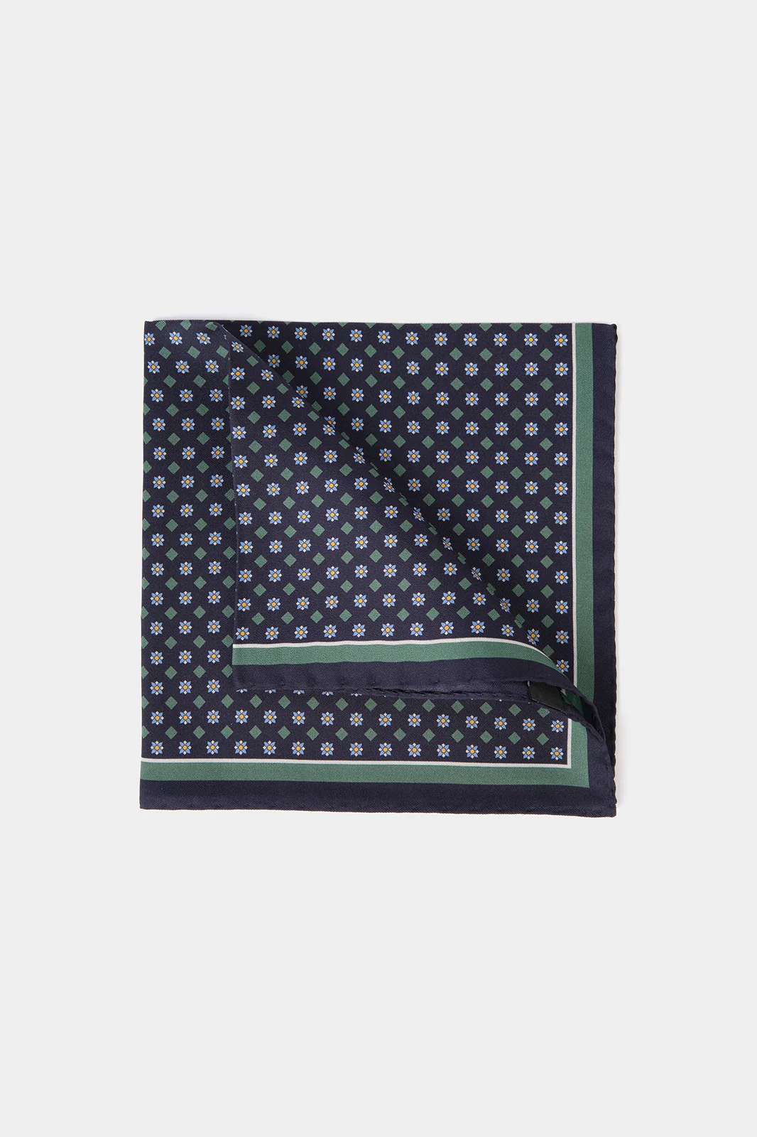 Pochette fond bleu foncé à motif floral bleu et vert