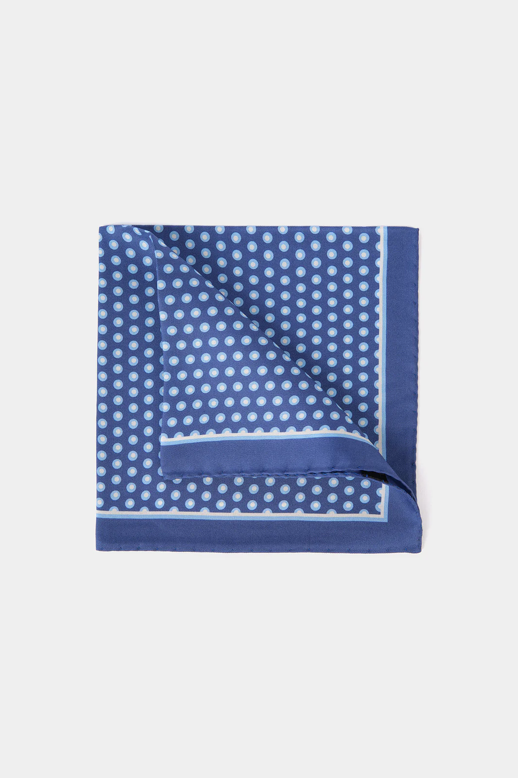 Pochette fond bleu lumineux à motifs pois blancs et bleu clair